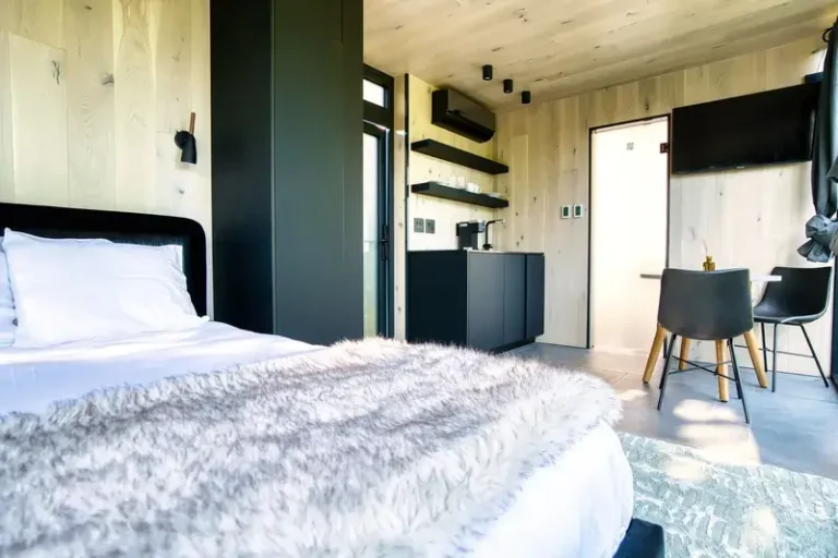 Home 18 Suite living space with contemporary furnishings at Haus Windham